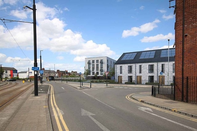 CGI showing plans for Central Retail Park in Rochdale. This view is along Maclure Road towards Drake Street.