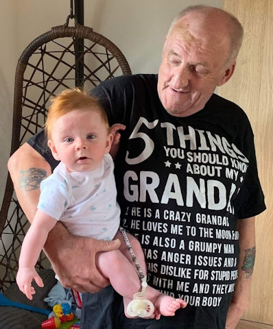 Tony Simpson with his grandson