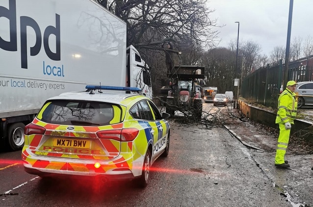 The lorry had to be cut free after getting stuck on a branch