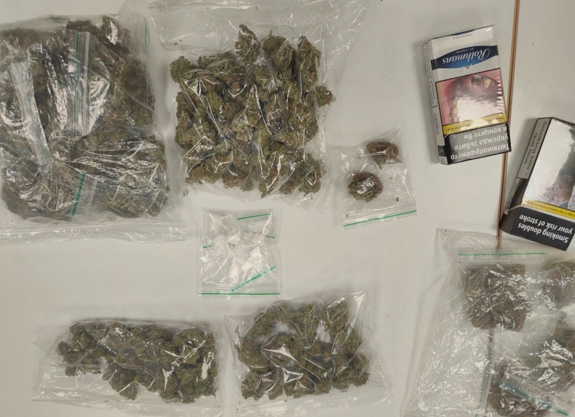 Revoke officers carried searches at two addresses in Rochdale where a large amount of cannabis, drug-supply paraphernalia, more than £15,000 in cash, criminal property assets, a knuckleduster and two extendable batons were discovered