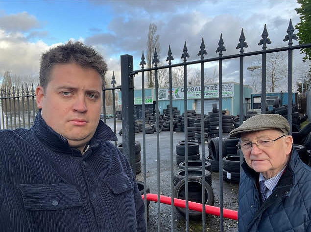 Councillor John Blundell and Councillor Billy Sheerin outside Globaltyre, in Castleton, Rochdale