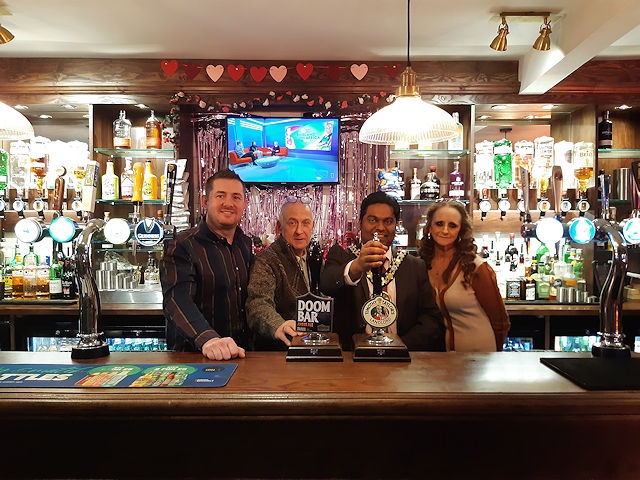 Mayor of Rochdale pulls a pint at the Oddfellows (from left to right): Matthew Parkinson, Trev Healey, Councillor Ali Ahmed and Theresa Healey