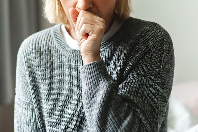 Adult woman, coughing, sore throat, stock image