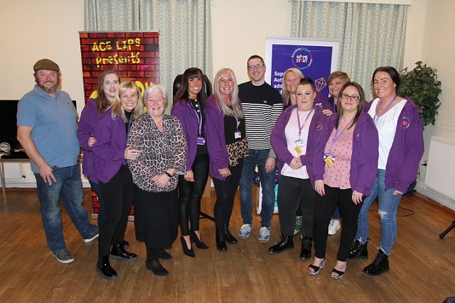 Dave Twentyman (centre) with staff from Home-Start Rochdale and Bury