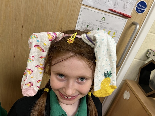 A Shawclough Community Primary School pupil gets creative with her socks