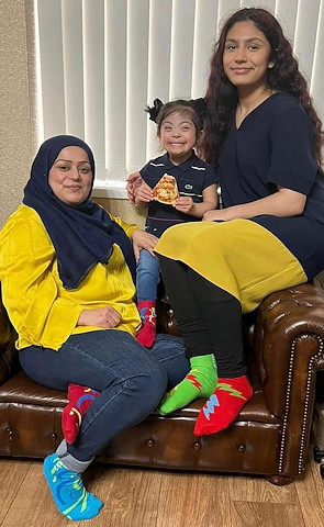 Shahnaz Moughal, a Rochdale DS All Stars mum, and family in their funky footwear