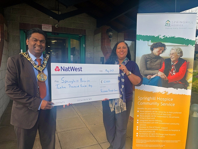 £12,000 donation to Springhill Hospice, presented by the Mayor of Rochdale, Councillor Ali Ahmed to Joanne Ali