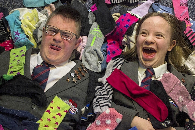 Whitworth Community High School students Michael Simpson and Gabriella Greenwood prepare to celebrate World Down Syndrome Day by helping with an odd sock World Record