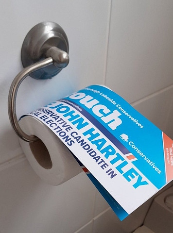 Councillor Janet Emsley's tweet showing John Hartley's election leaflet as toilet paper (via Twitter)