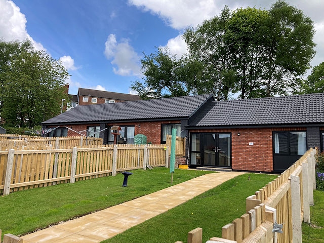 The Louise Gardens homes received external wall insulation, new roofs, windows and doors, as well as mechanical ventilation and complemented with environmental works