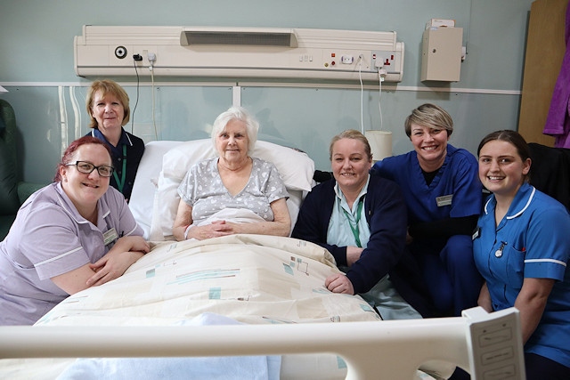 Clinical staff at Springhill Hospice with a patient