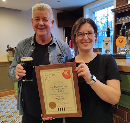 Peter Alexander of Rochdale, Oldham & Bury CAMRA with Lucy Kelly, general manager of The Flying Horse Hotel