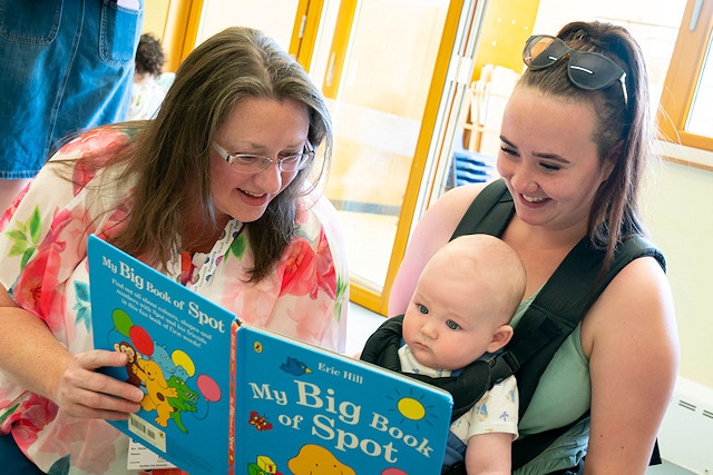 Councillor Rachel Massey with a parent and toddler at Derby Street Children's Centre