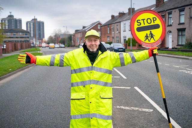 Anthony Hassett works on the junction of Sheriff Street and Jane Street near Rochdale town centre