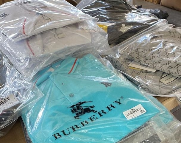 In total a staggering £14 million worth of counterfeit items were seized and stripped from the building in just over 24 hours