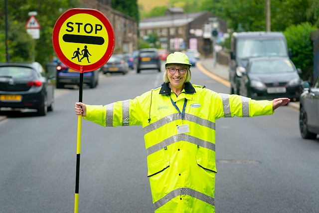 Jacqueline Robinson has been helping children get safely to and from Stansfield Hall Primary School since 1988