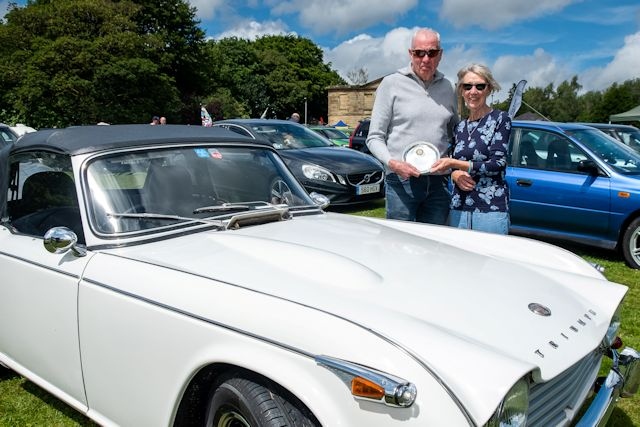 Car of the Show winner Philip Dean with Rochdale Rotary president Linda Mainwaring