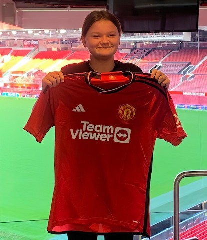 Brooklyn Hernon with her Manchester United shirt