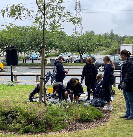 Children from St John’s Thornham school joined Middleton in Bloom and Rochdale in Bloom to spruce up the Reg Birch Community Garden in Slattocks