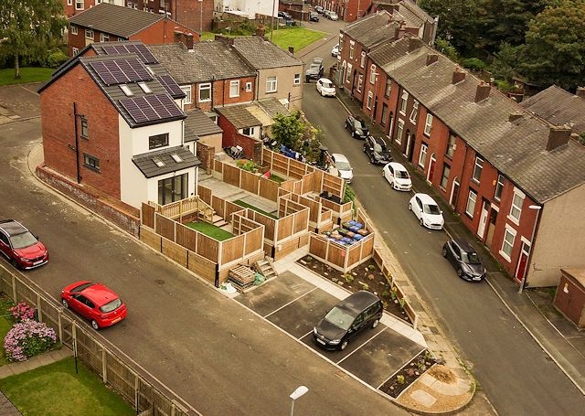 Designed by the PHA Architects and built by Deji Properties Ltd., the development has added two three-bedroom houses with two parking spaces each next to houses on Larkhill Court and Ogden Street