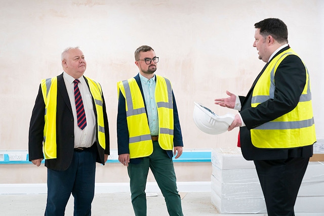 L-R: Council leader, Councillor Neil Emmott, and cabinet member for regeneration and housing, Councillor Danny Meredith, on a recent site visit with housing officer, Stuart Morris