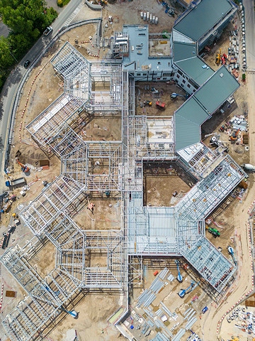 Drone Footage of construction site for £105.9 million health unit development at North Manchester General Hospital