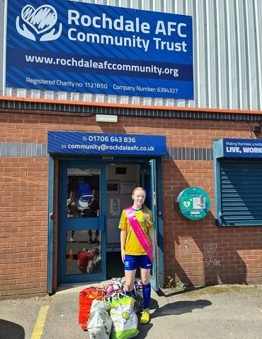 Evie collected football boots for Rochdale AFC Community Trust