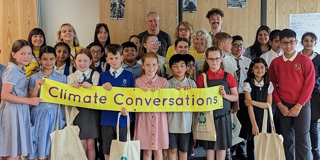 Pictured at the debate are school children, teachers, councillors and council officers