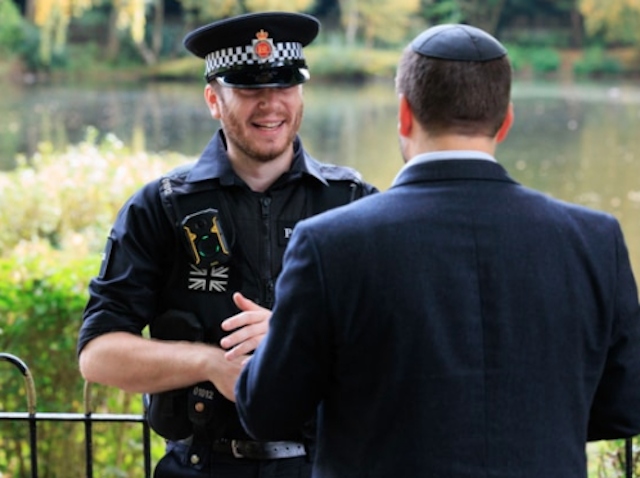 Officer talking to a resident