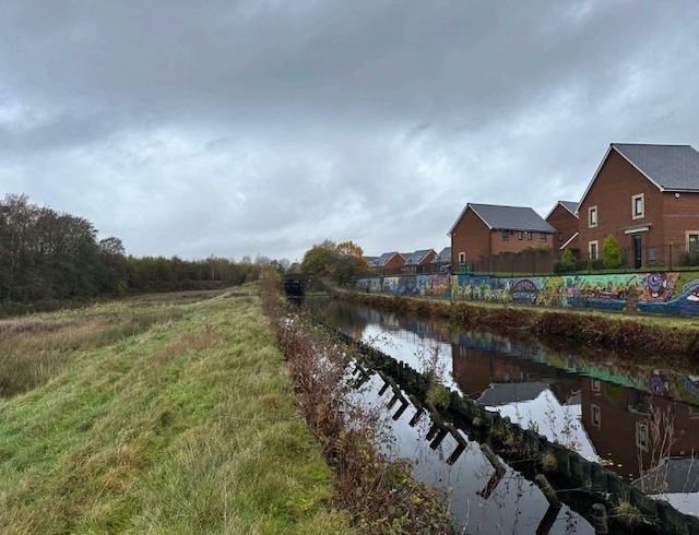 Eastern view of Trub Farm land in Rochdale, next to the canal