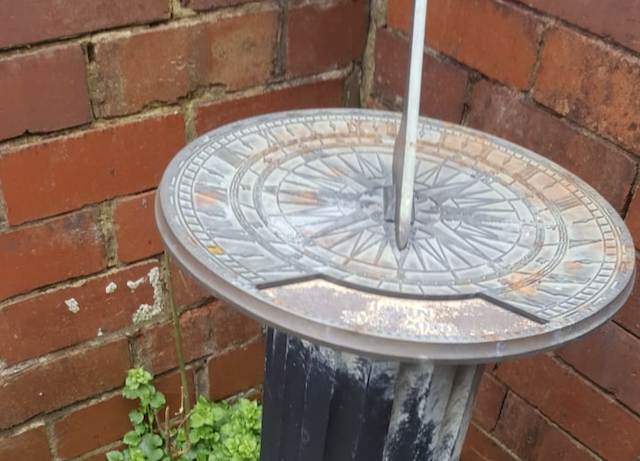 The sundial which had the ashes inside 