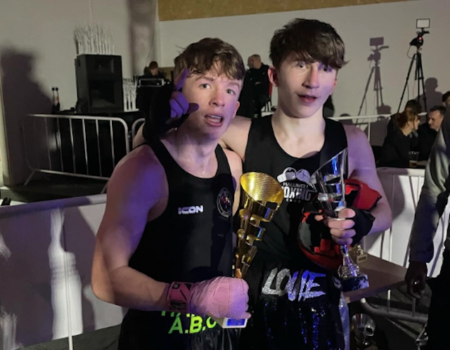 Isaac and Louie with trophy's after their bout