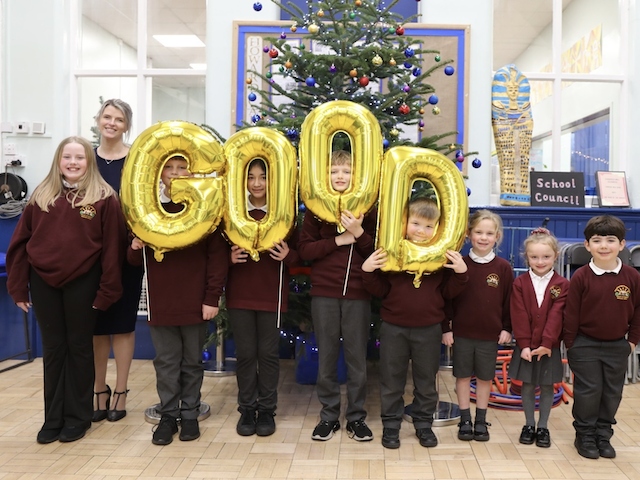 Stansfield Hall Primary School children celebrating their latest Ofsted result