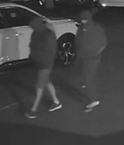 Police want to talk to these two men about an incident at a car dealership in Rochdale