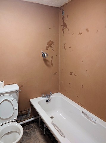 Work underway to replace the shower in the home of an RBH tenant living on the Freehold estate in Rochdale