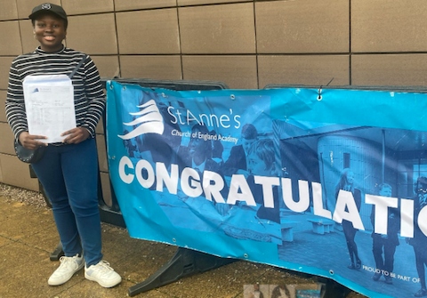 A student at St Anne’s Academy celebrating her results 