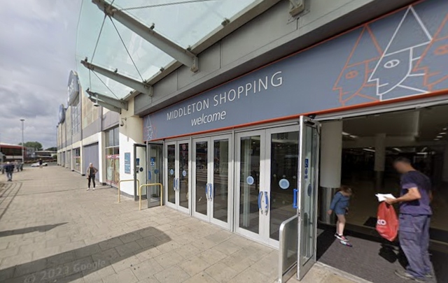 Numerous police officers swarmed the shopping centre to find a man who was seriously hurt