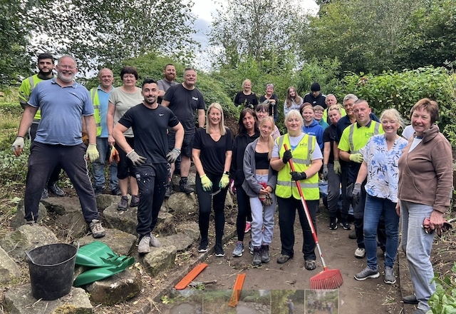 Volunteers rallied together to assist Springhill Hospice in transforming its sensory garden