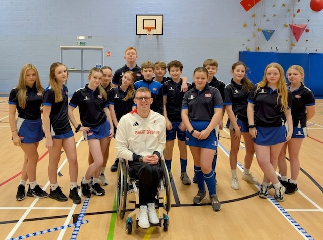 British Record Holder for 1,500m wheelchair racing Nathan Maguire trains Sports Ambassadors from Whitworth Community High School in Boccia