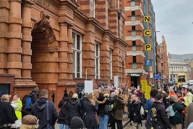 Protestors outside Andy Burnham's office in Manchester