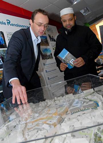 Wilson Bowden representative and a visitor at the exhibition at 30 Yorkshire Street