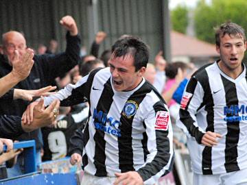 Ecstatic: Chris Dagnall celebrates his injury time winner