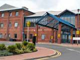 Special measures: Rochdale Infirmary has set up extra beds to cope with an increase in patients