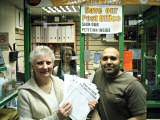 Jay Patel from Buersil Post Office and local resident Pat Colclough with petitions