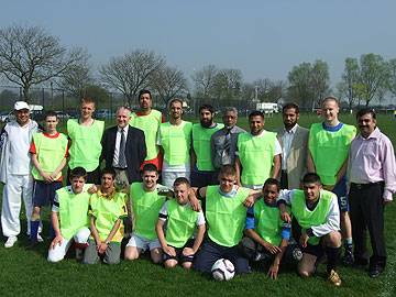 Multi-faith team with guests.