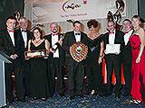 Leach team accepting their award form Pall-Ex MD, Hilary Devey