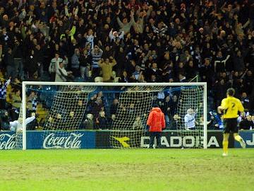 Celebration: County fans rejoice after Liam Dickinson's second goal