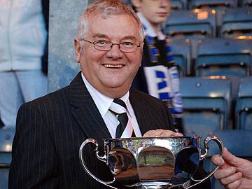 Rochdale Chairman Chris Dunphy holds the Rose Bowl