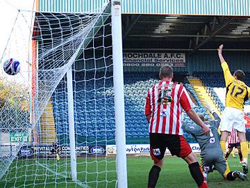 Glenn Murray celebrates as his header hits the Brentford net