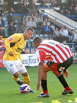 Rochdale winger Ben Muirhead attacks Darius Charles